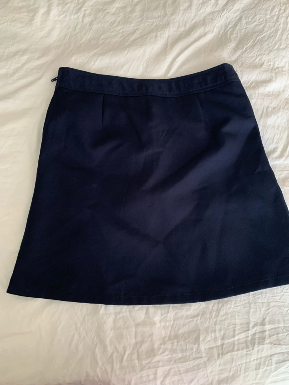 Navy Pleated Mini Skirt with Side Buckle Detail